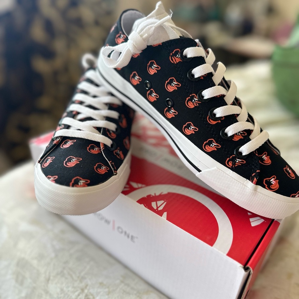 Black and White Sneakers with BALTIMORE OREOLES Logo Pattern.